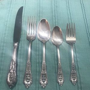 Antique sterling silverware by Wallace. 12 setting